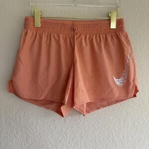 NIKE peach running shorts